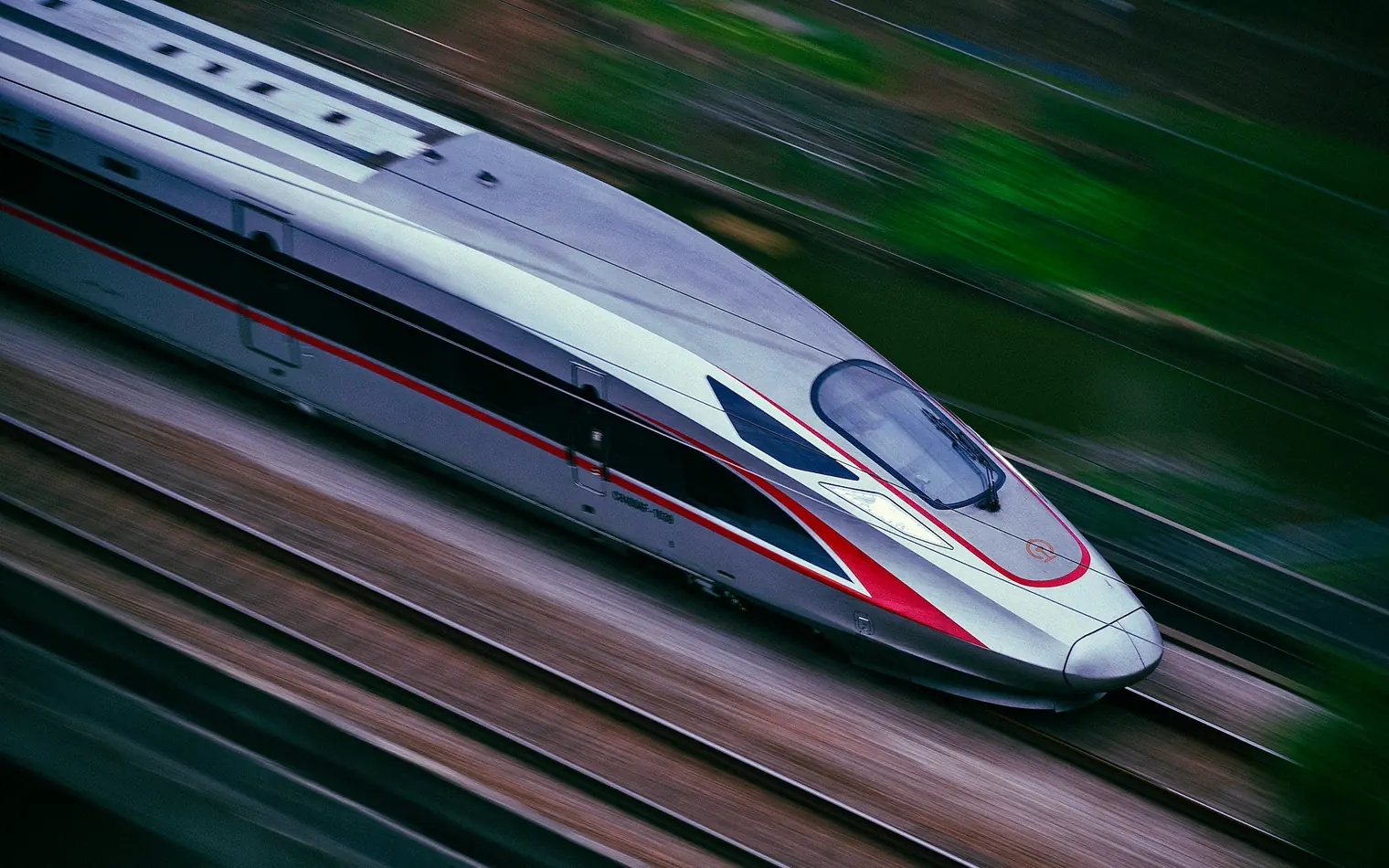 A high-speed train racing along the tracks near Foshan, Guangdong, China