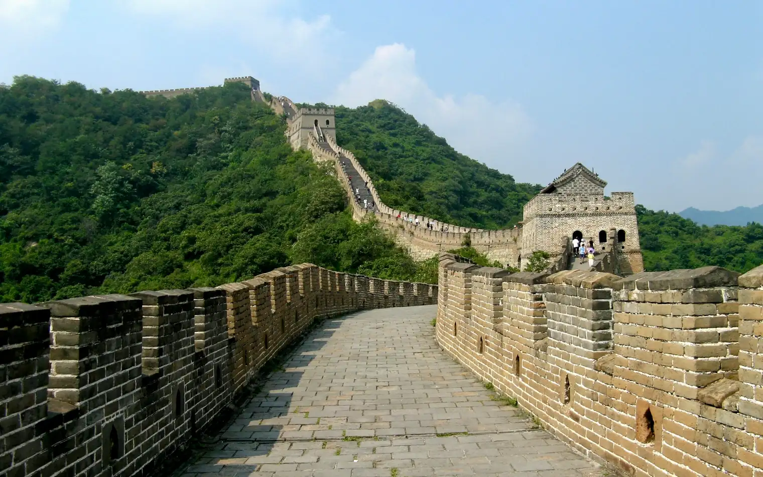 The Great Wall at Mutianyu winding over green hills, Beijing, China