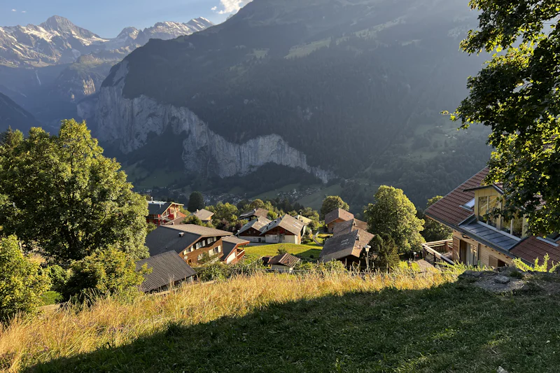 Chalets above the cliff-lined Lauterbrunnen valley in the Bernese Oberland, Switzerland