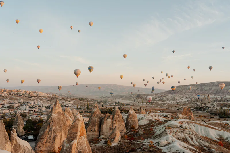 Hot-air balloons at sunrise over Göreme, Cappadocia, Turkey