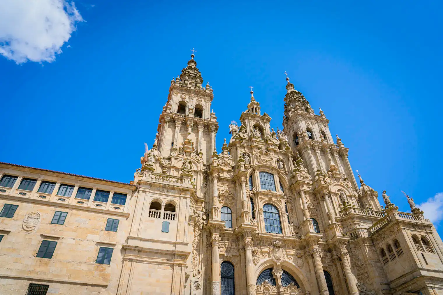 The baroque west front of Santiago de Compostela cathedral seen from the Praza do Obradoiro, Galicia